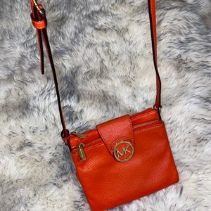 Michael Kors orange crossbody bag